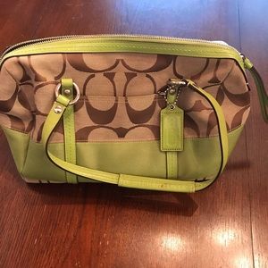 Signature Coach Bag with Green Accents